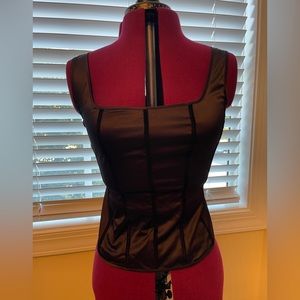 Gorgeous corset top. Size small. Side zipper on right side. Gently used.